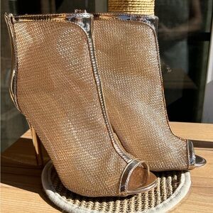 Rose gold open toe mesh heel.